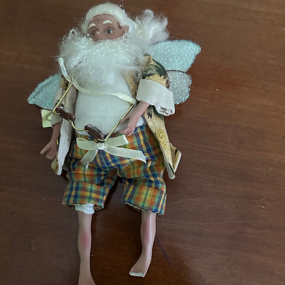 Whimsical Fairy Figurine with Plaid Shorts